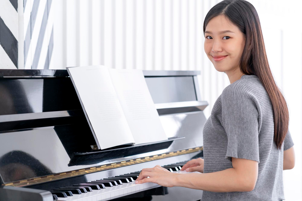 Classical piano student practicing during daytime